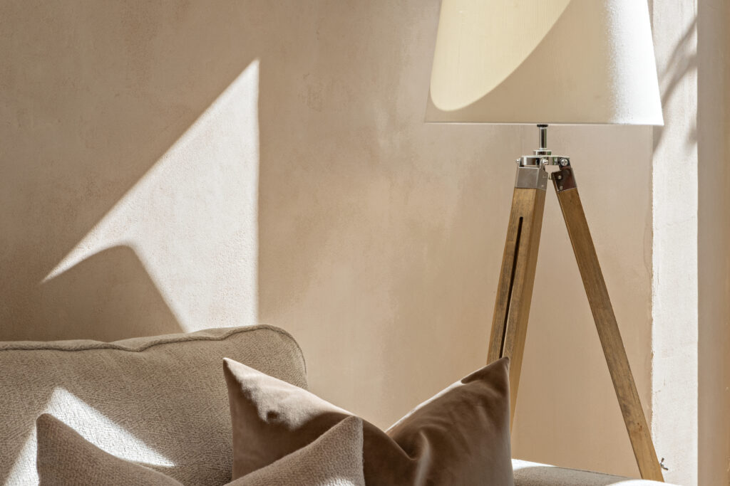 Natural clay plaster on the walls adds warmth and a sense of serenity to the home. Photo Credit: Craig A. Williams.